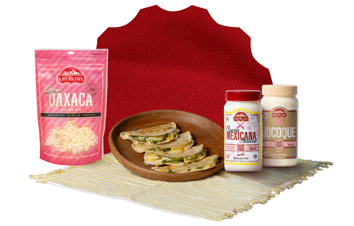 Los Altos cheeses and crema served with a Mexican dish